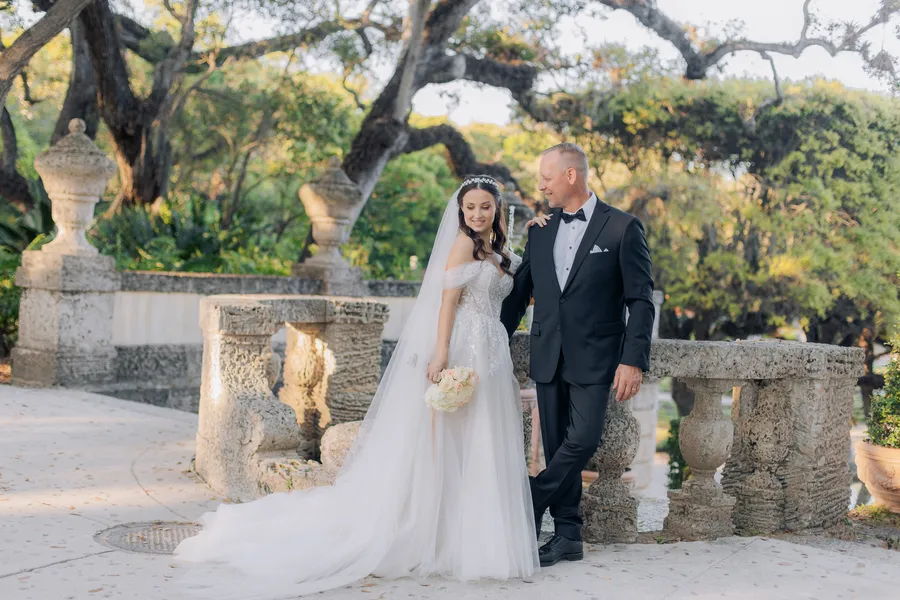 Romantic wedding portrait beneath mature garden trees — Steven and Iryna wedding