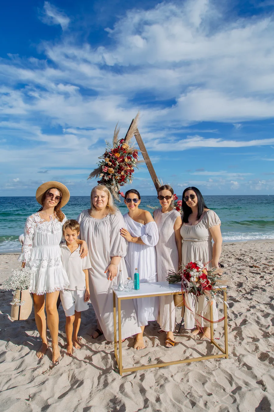 Wedding party celebrating together at the beach — Roman and Victoria wedding