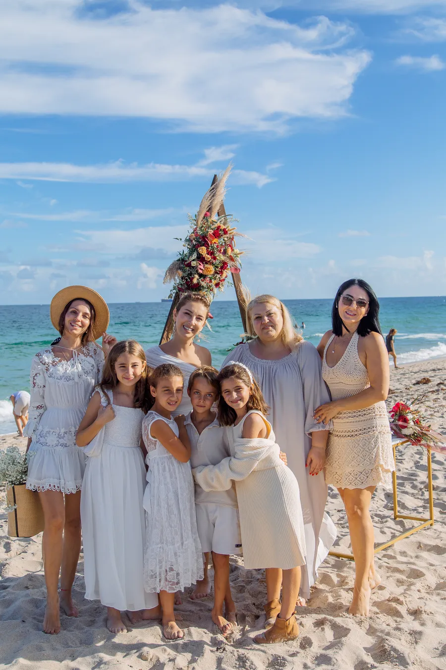 Wedding party celebrating together at the beach — Roman and Victoria wedding