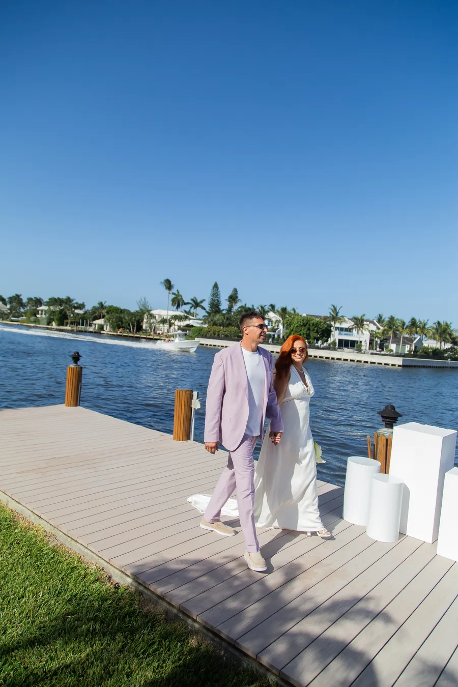 Bride and groom sharing a relaxed waterfront portrait — Alexander and Olga wedding