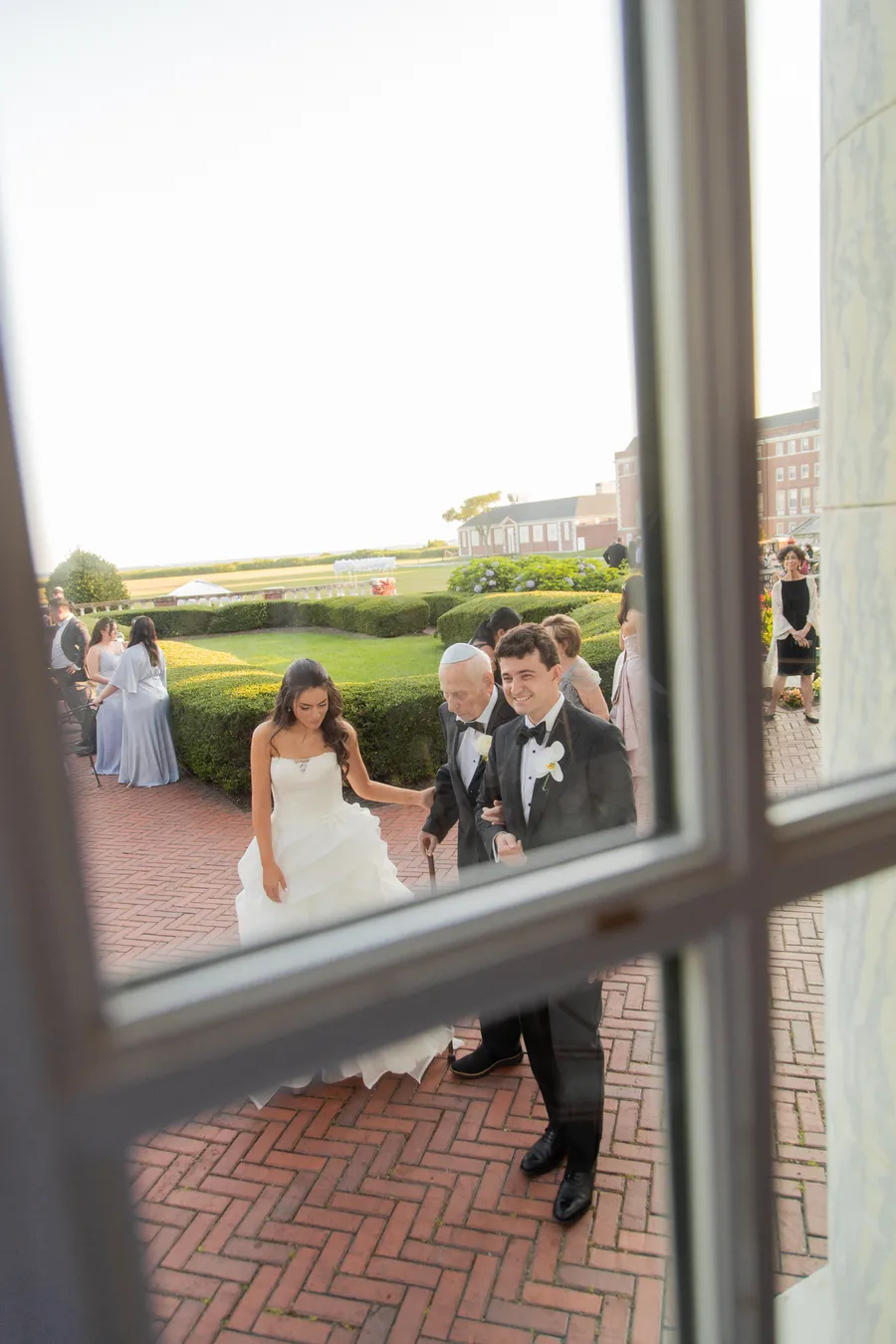 Wedding guest portrait in warm evening light — David and Katia wedding