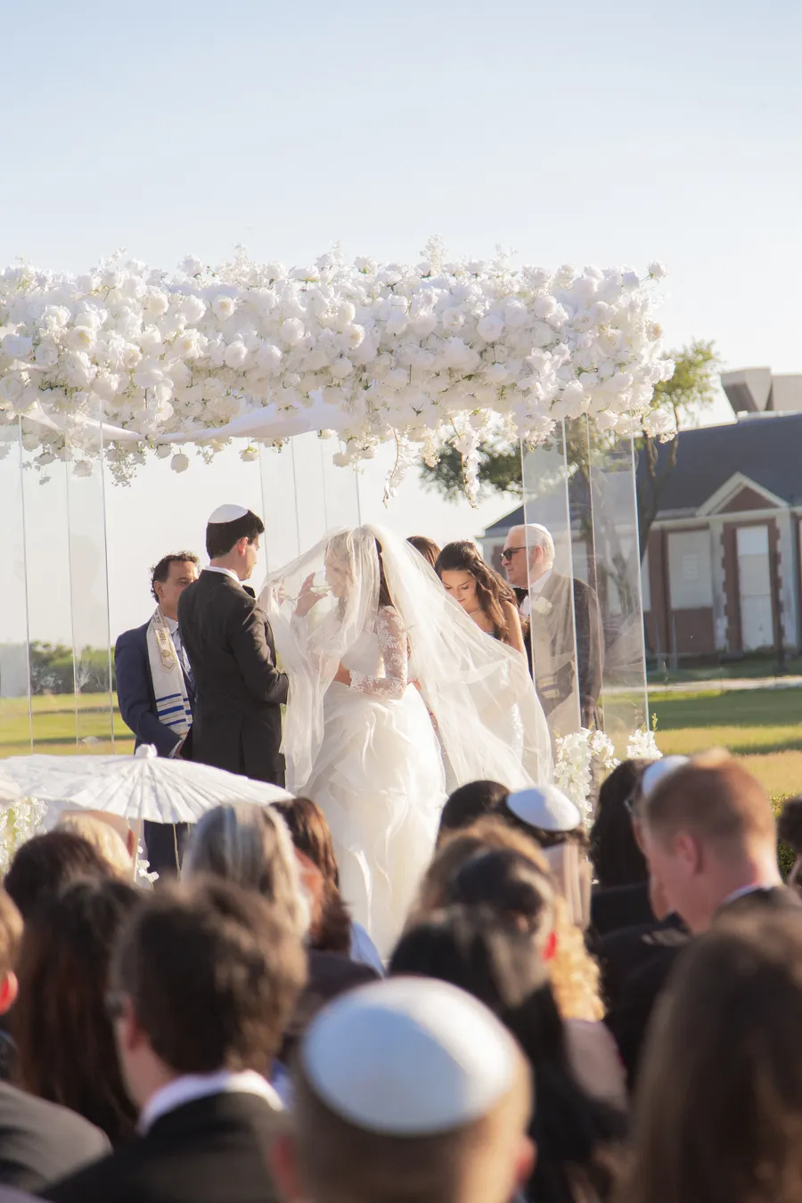 Wedding guests watching the couple exchange vows — David and Katia wedding