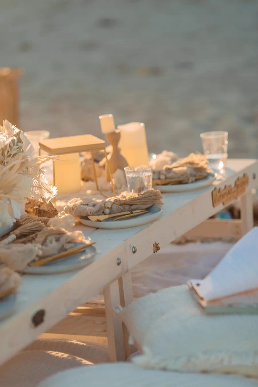 Sunset portrait of a wedding guest on the sand — Roman and Victoria wedding