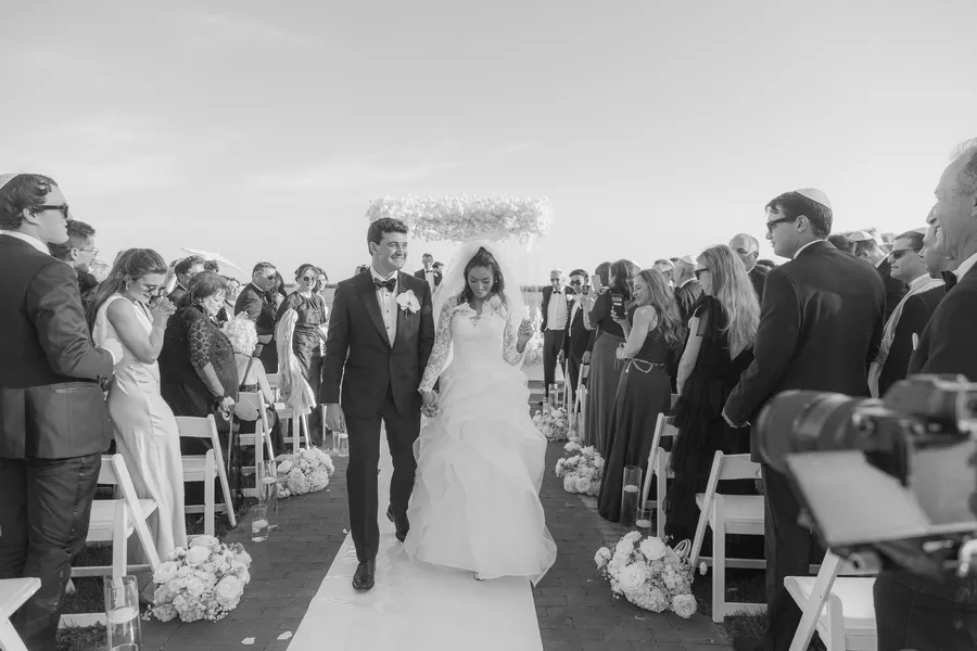 Wedding guests watching the couple exchange vows — David and Katia wedding