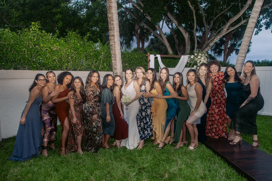 Wedding guests posing together on the lawn — Chris and Laura wedding