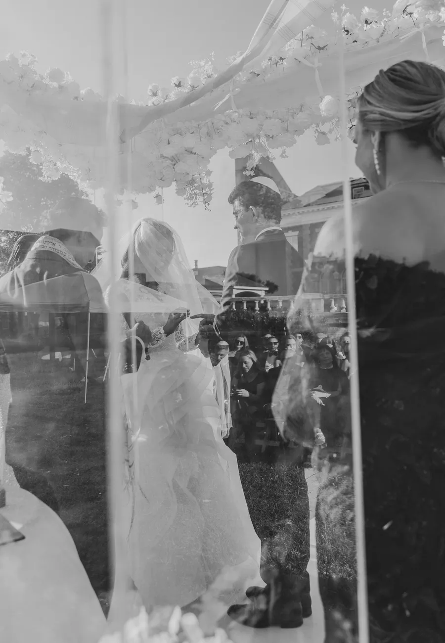 Black-and-white moment from the outdoor ceremony — David and Katia wedding