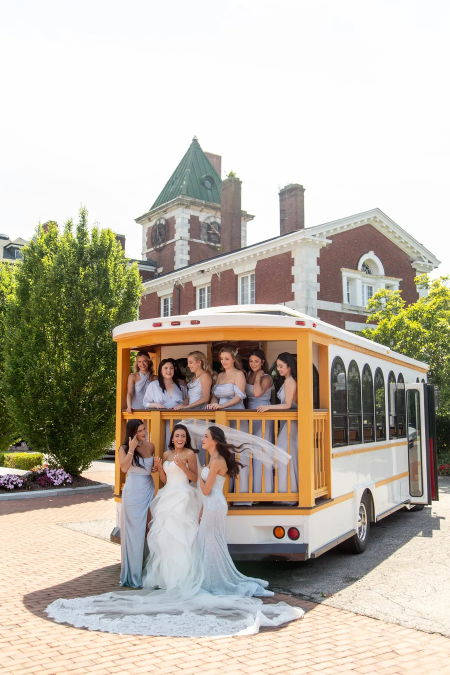 Bridal party arriving by vintage trolley — David and Katia wedding