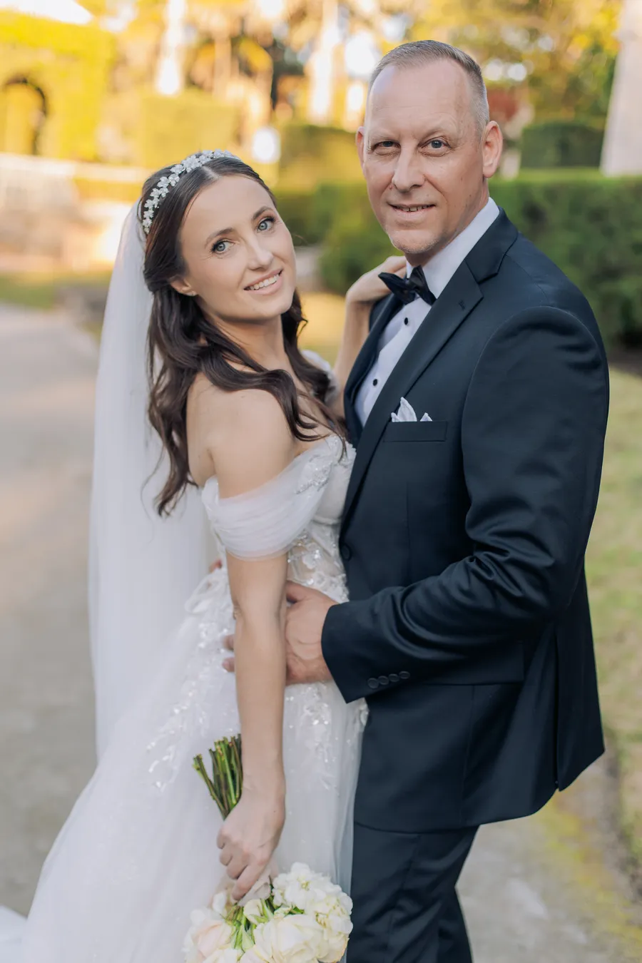 Groom portrait in a formal estate garden — Steven and Iryna wedding