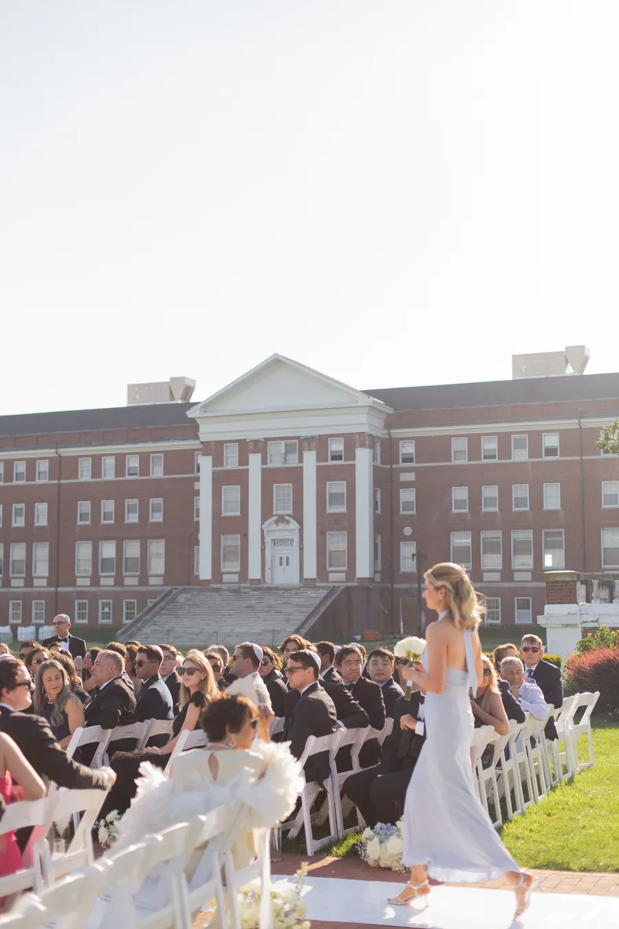Wedding guests watching the couple exchange vows — David and Katia wedding