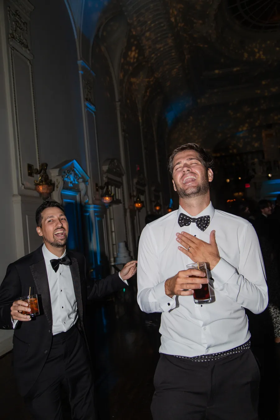 Black-and-white candid from the wedding reception — David and Katia wedding