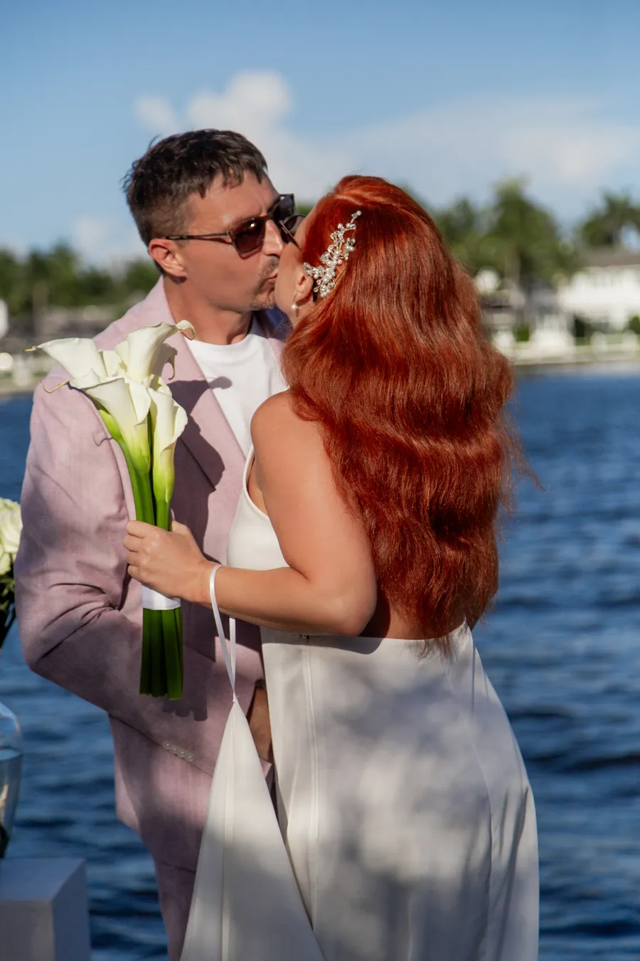 Newlyweds sharing a kiss after the ceremony — Alexander and Olga wedding