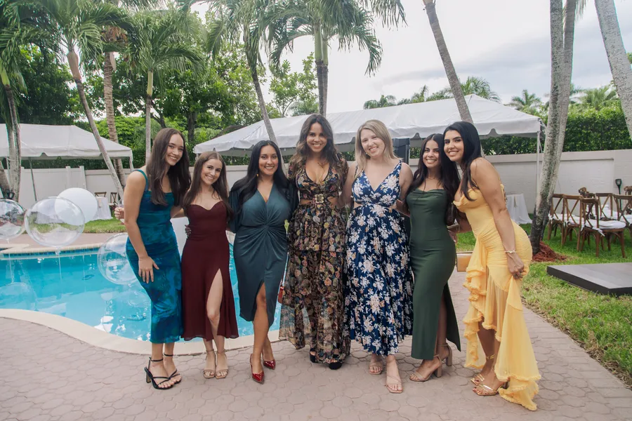 Wedding guests gathering beside the pool — Chris and Laura wedding
