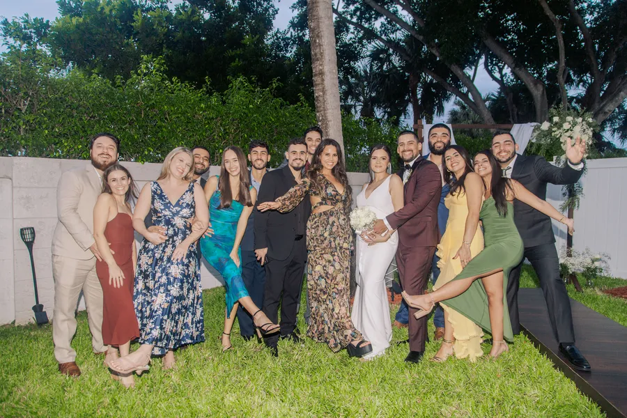 Bride celebrating with friends after the ceremony — Chris and Laura wedding