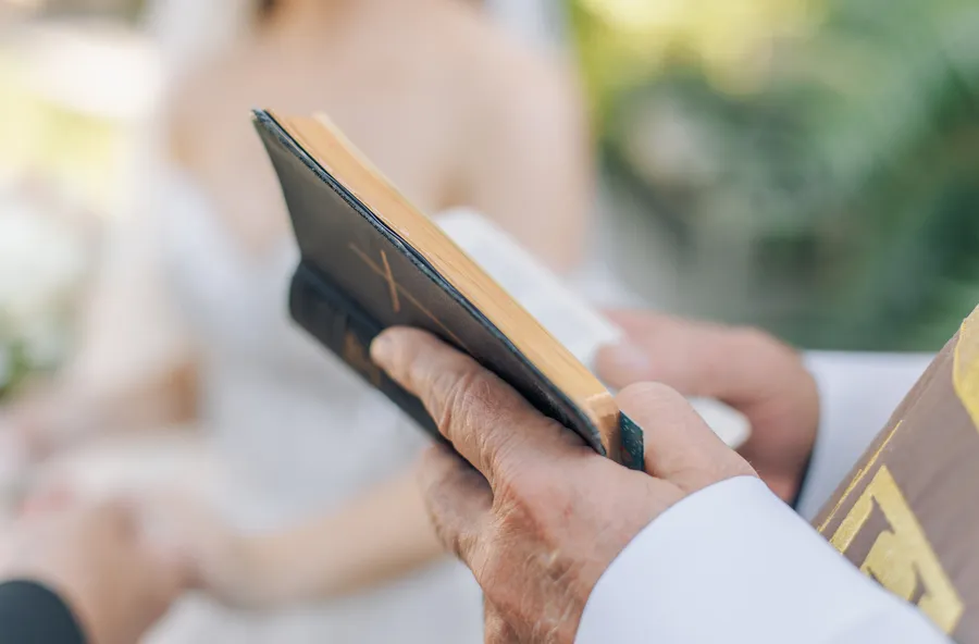 Close detail of the couple exchanging rings — Steven and Iryna wedding