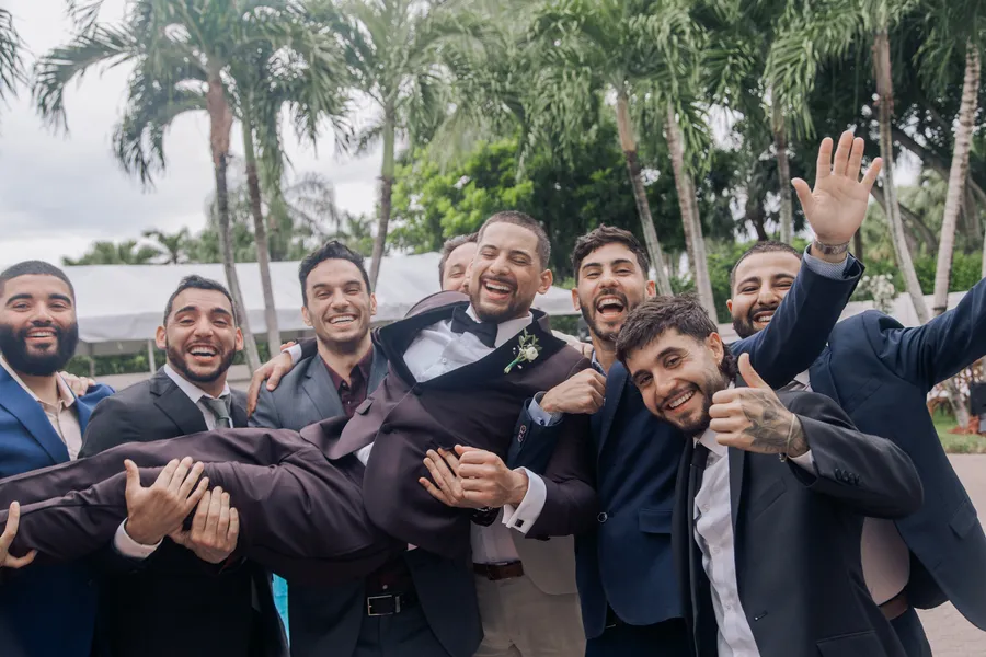 Groom and groomsmen celebrating before the ceremony — Chris and Laura wedding