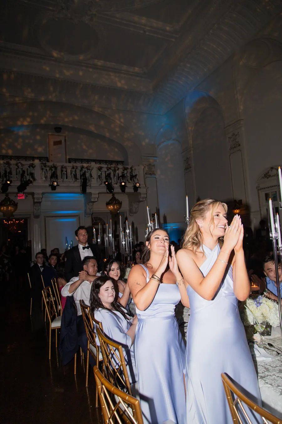 Bride and groom dancing beneath warm reception lights — David and Katia wedding