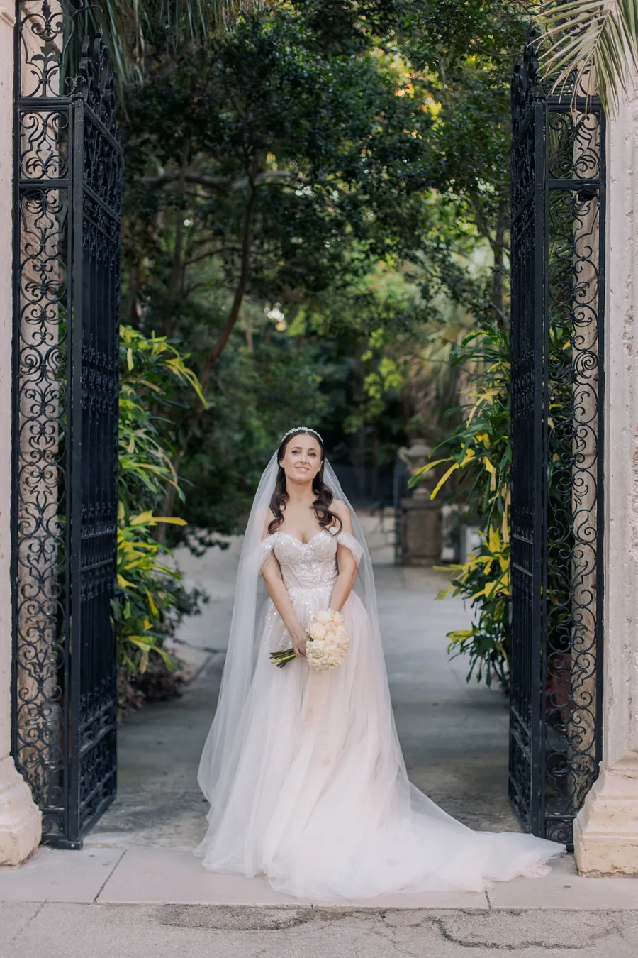 Romantic wedding portrait beneath mature garden trees — Steven and Iryna wedding