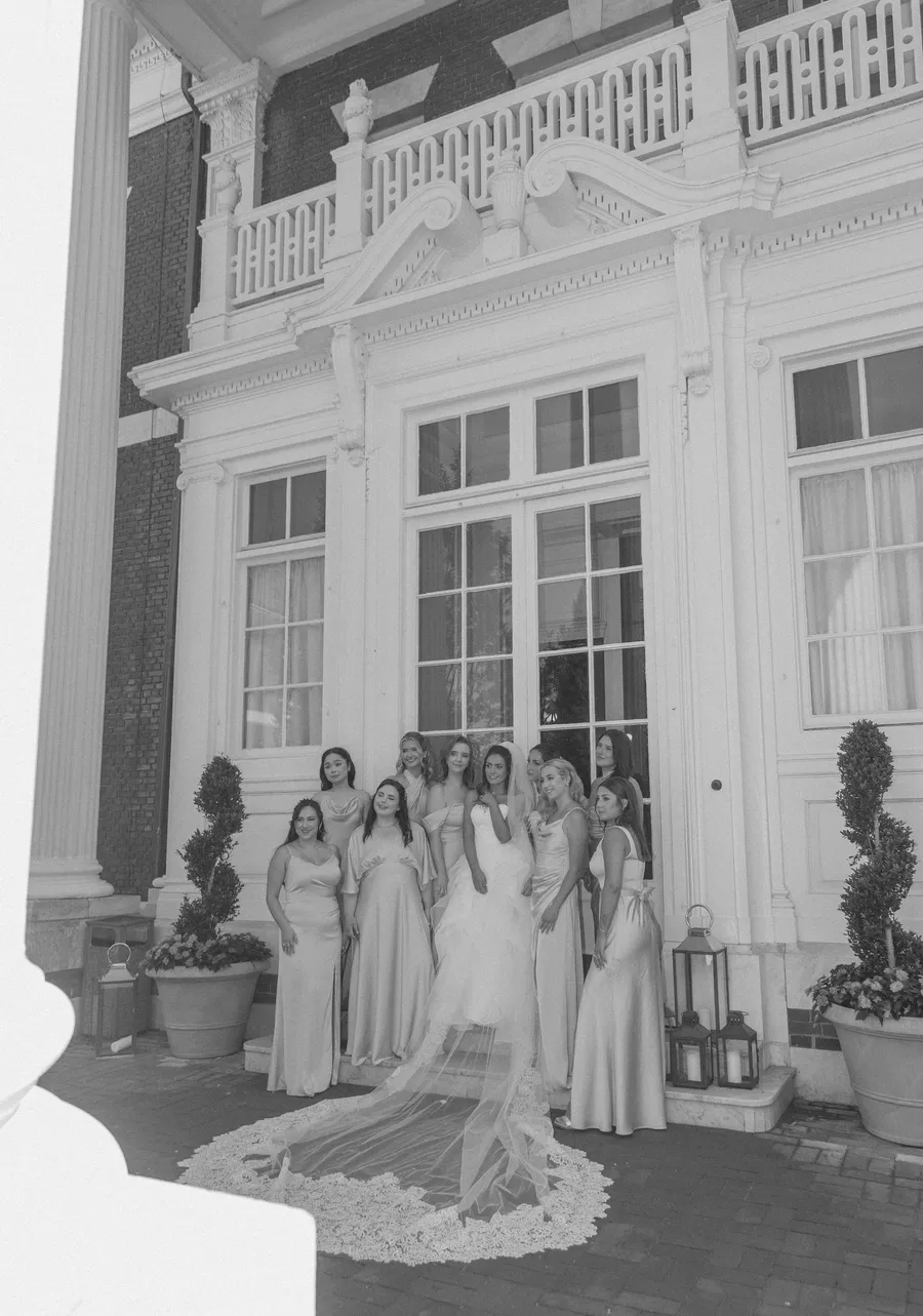 Black-and-white bridal party portrait in the garden — David and Katia wedding