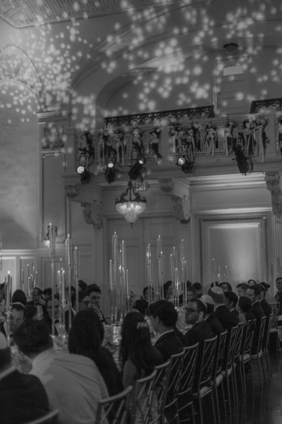 Black-and-white candid from the wedding reception — David and Katia wedding