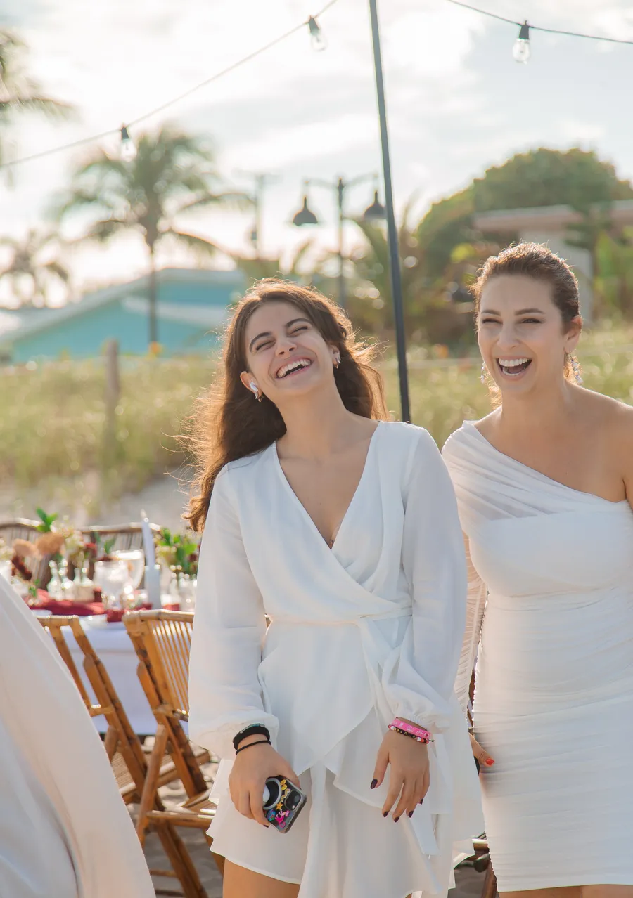 Bride and groom sharing a joyful beach portrait — Roman and Victoria wedding