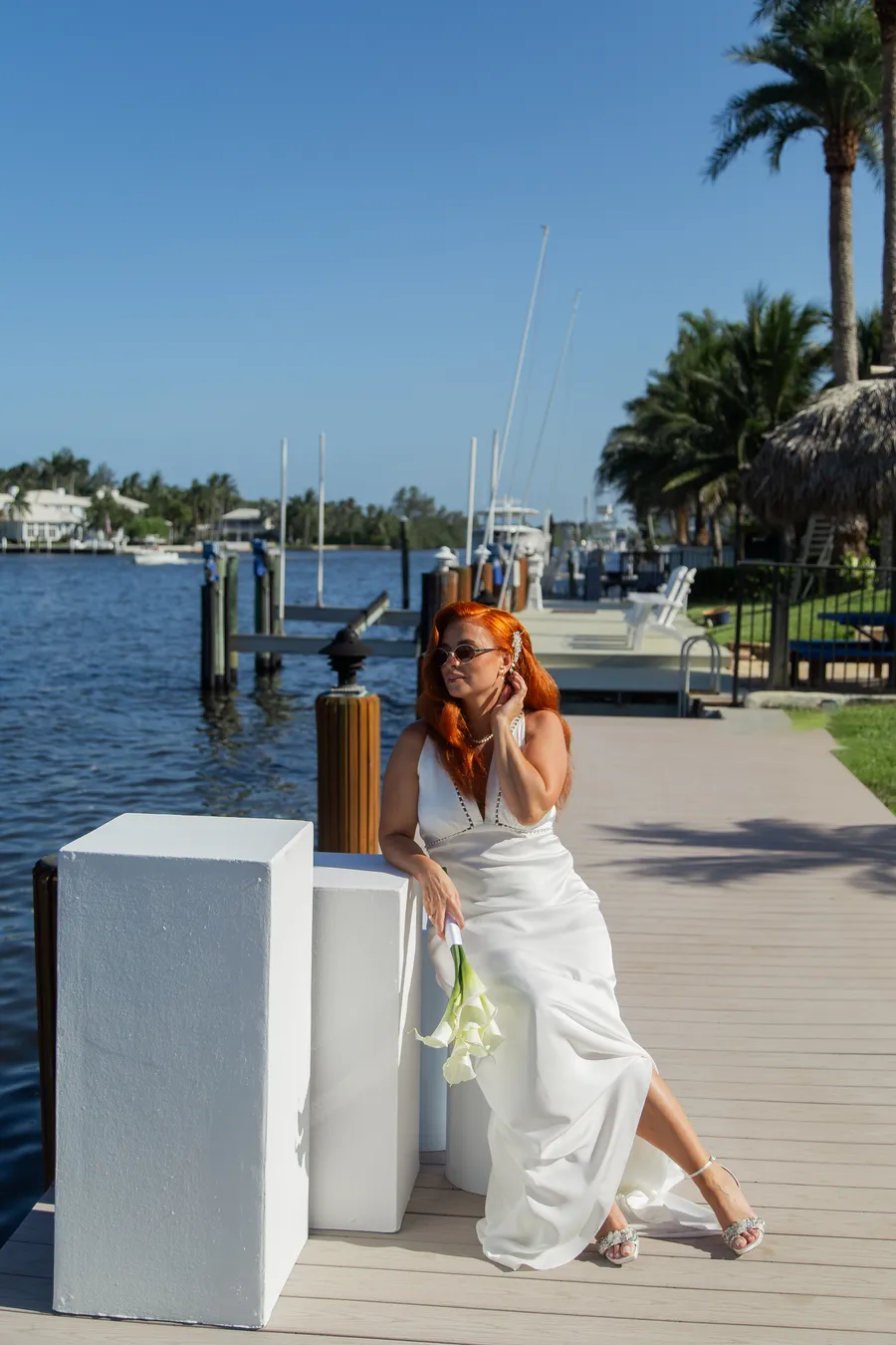 Bride and groom sharing a relaxed waterfront portrait — Alexander and Olga wedding