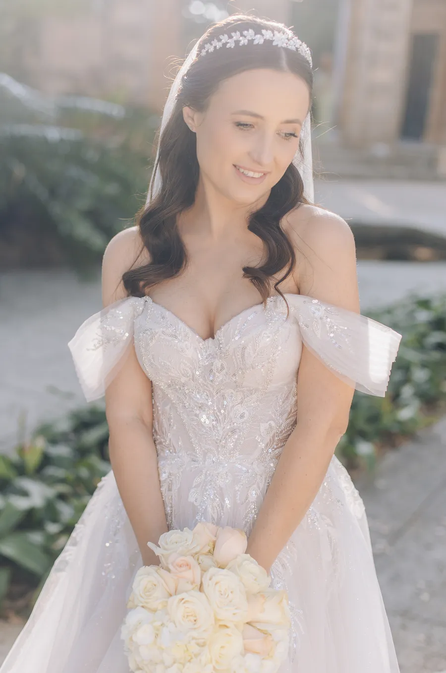 Newlyweds embracing after their garden ceremony — Steven and Iryna wedding