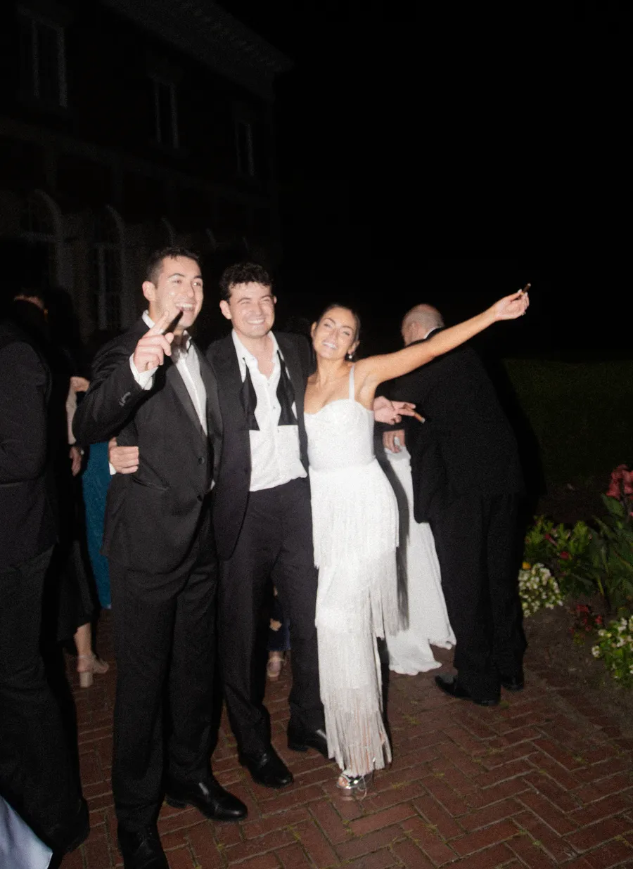 Wedding guests cheering on the dance floor — David and Katia wedding