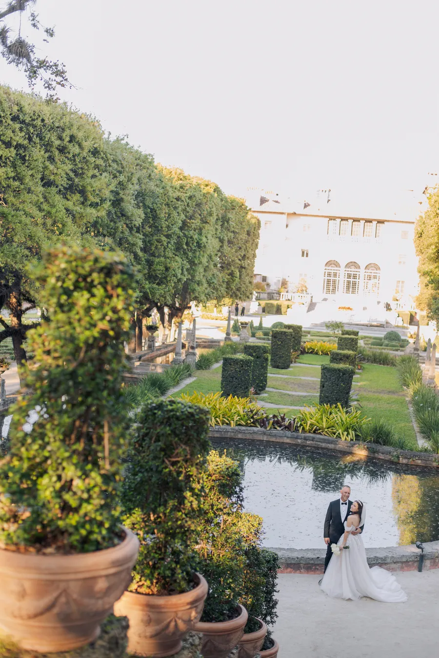 Groom portrait in a formal estate garden — Steven and Iryna wedding