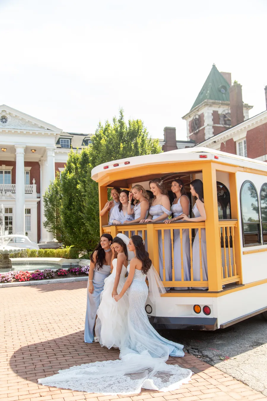 Bridal party arriving by vintage trolley — David and Katia wedding