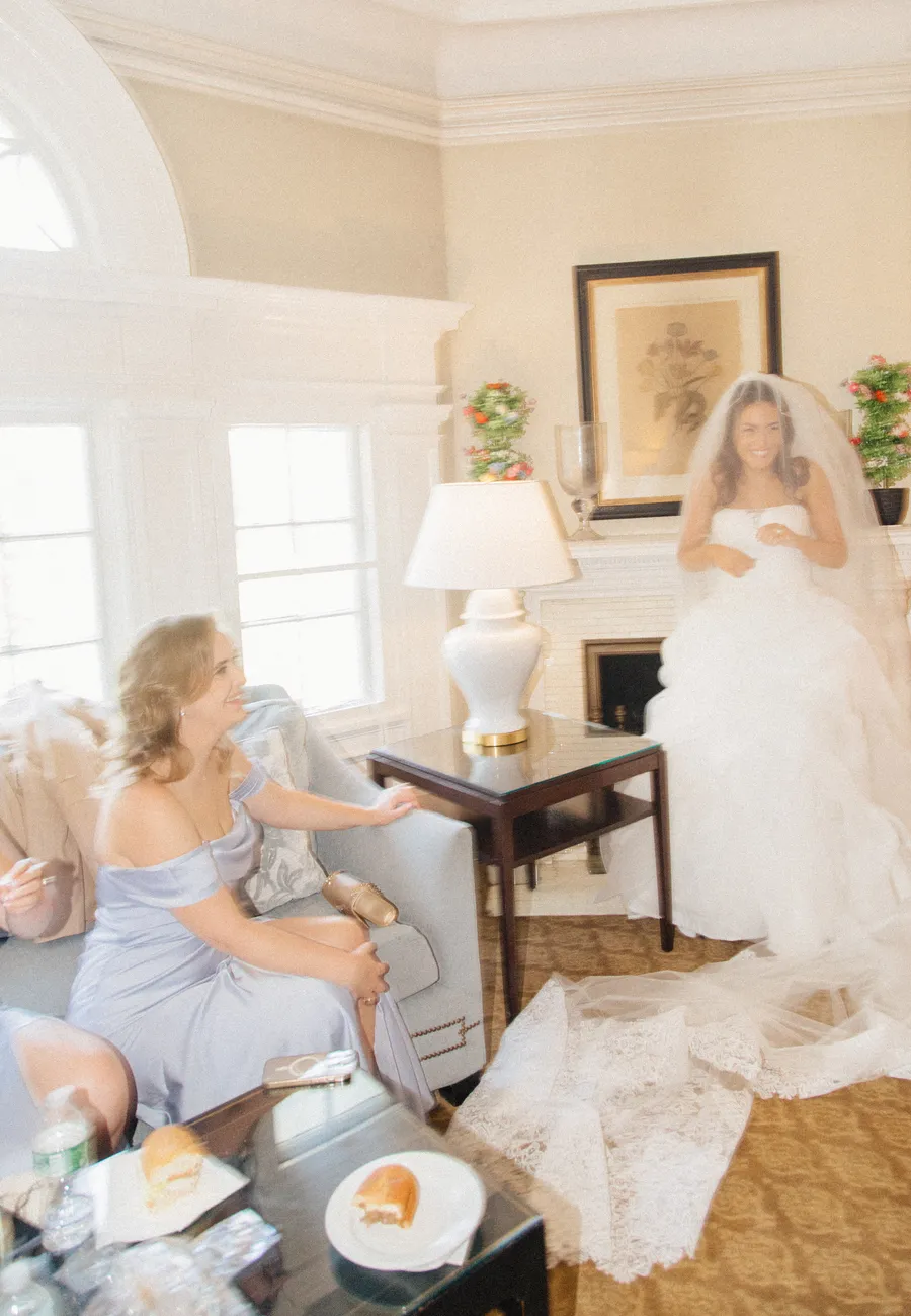Bride sharing a quiet preparation moment with family — David and Katia wedding