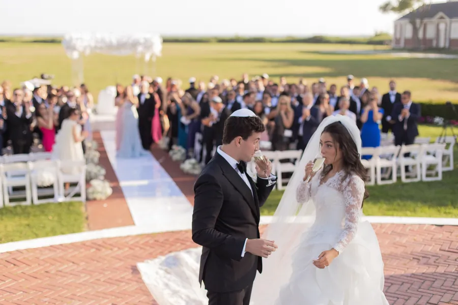 Black-and-white moment from the outdoor ceremony — David and Katia wedding