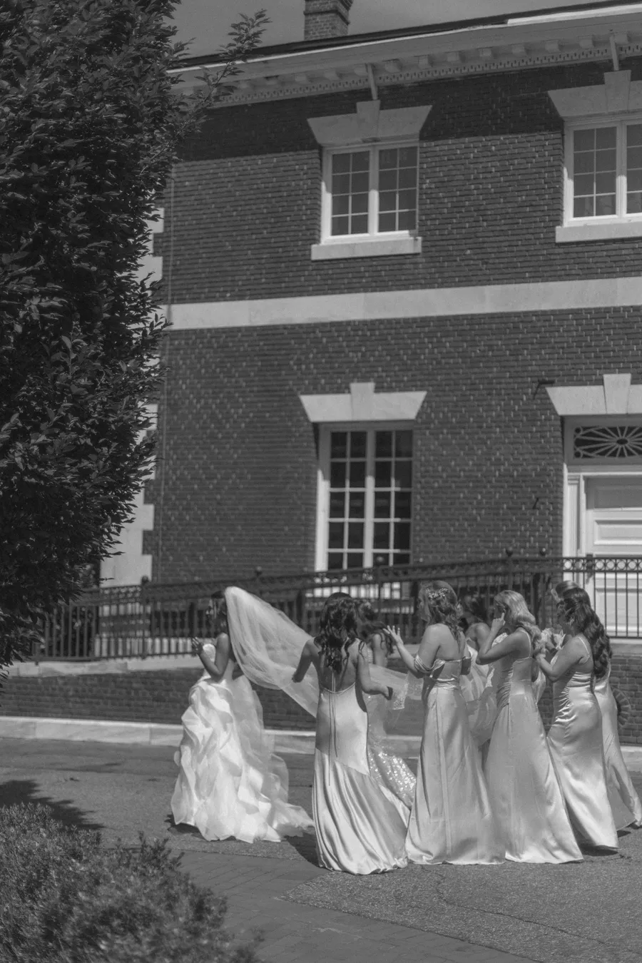 Bride and bridesmaids celebrating outside the estate — David and Katia wedding