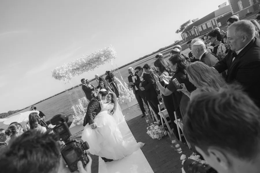 Bride walking down the outdoor ceremony aisle — David and Katia wedding