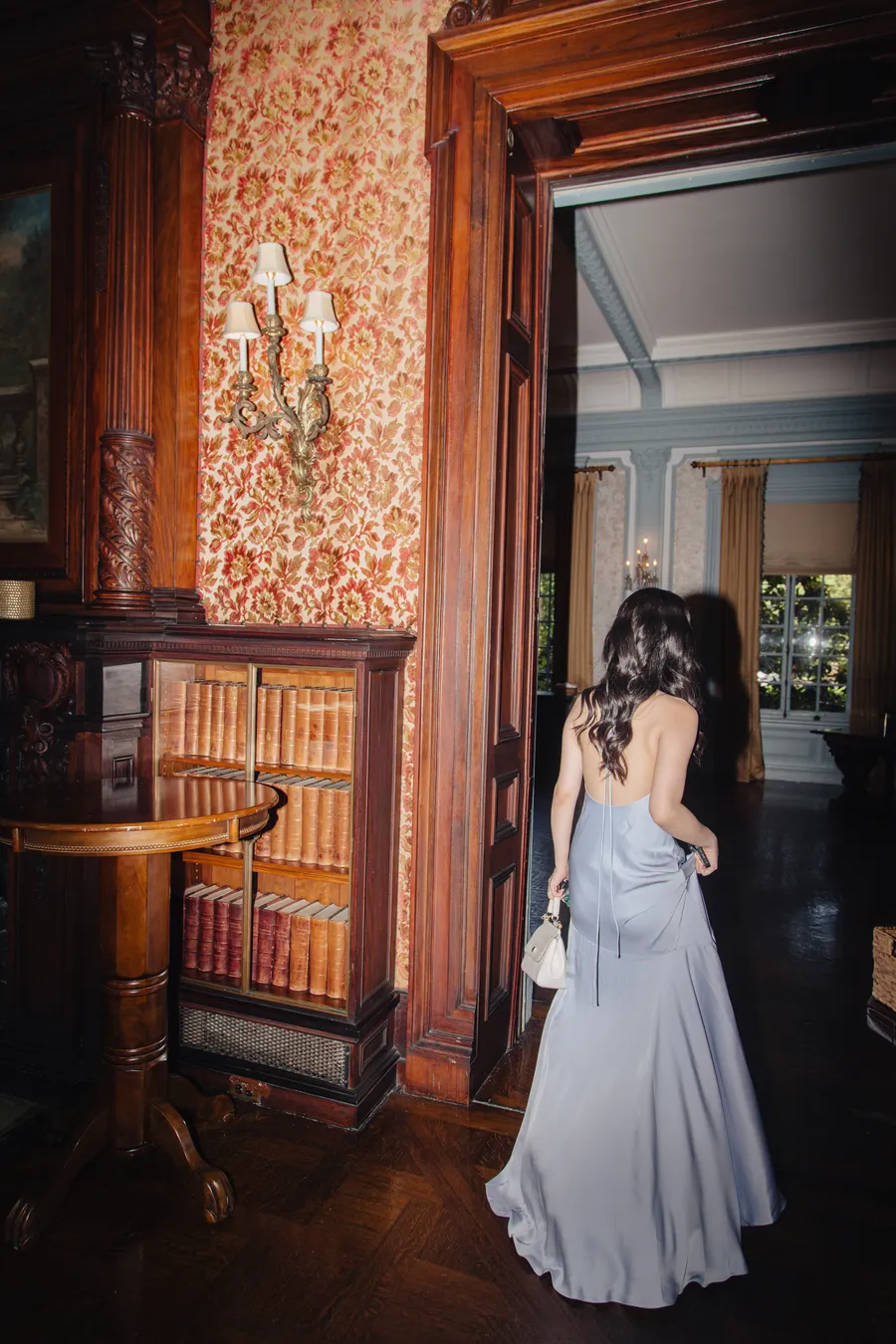 Groom and groomsmen posing in a wood-paneled library — David and Katia wedding
