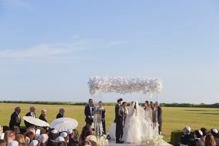 Bride walking down the outdoor ceremony aisle — David and Katia wedding