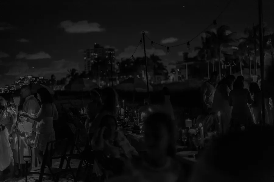 Black-and-white evening celebration on the beach — Roman and Victoria wedding